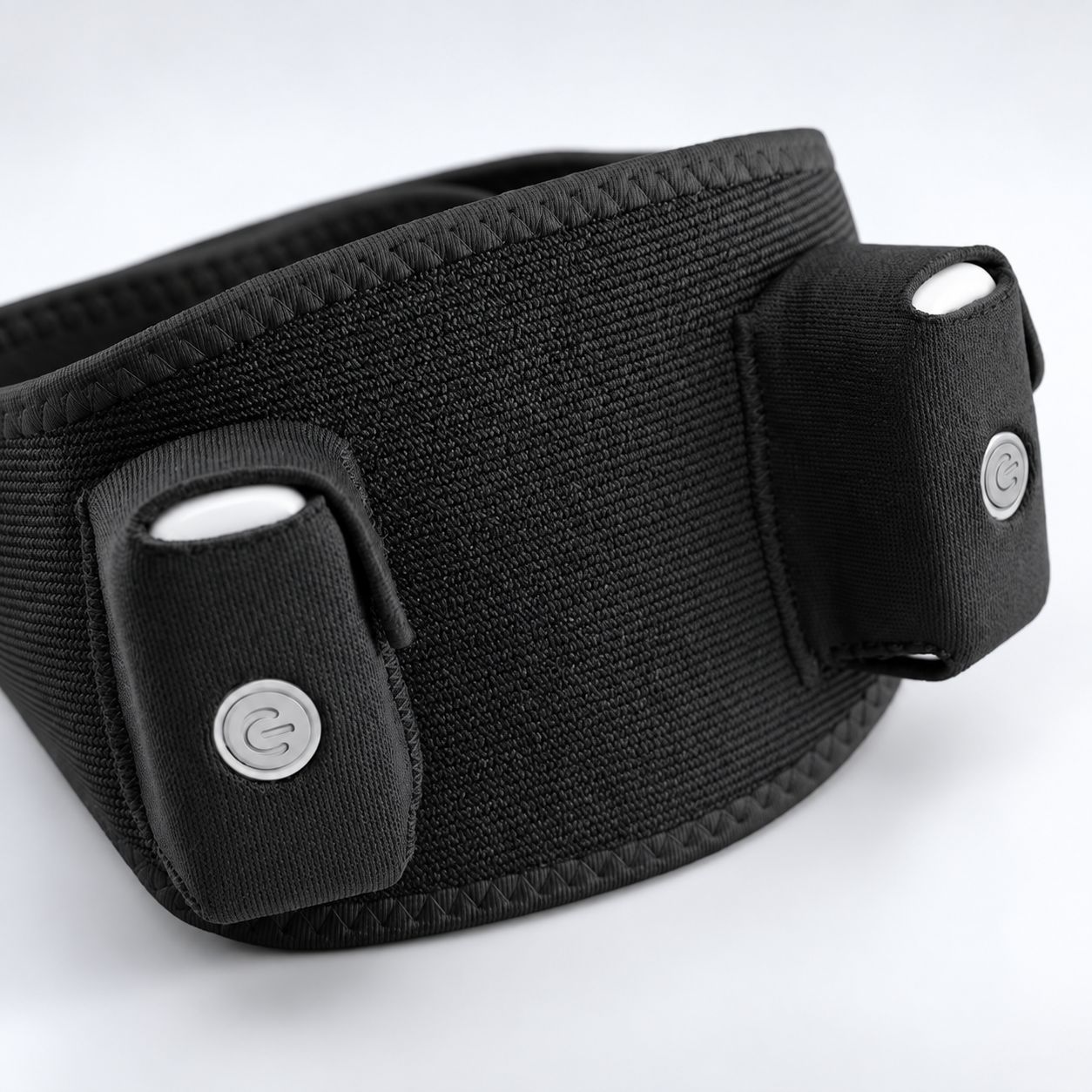 Black elastic band holding two SOLIGHT units